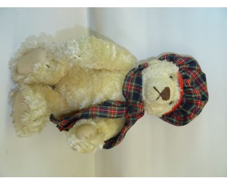 Another modern Steiff Bear in beige plush with growler.  12" (31cms) high. 