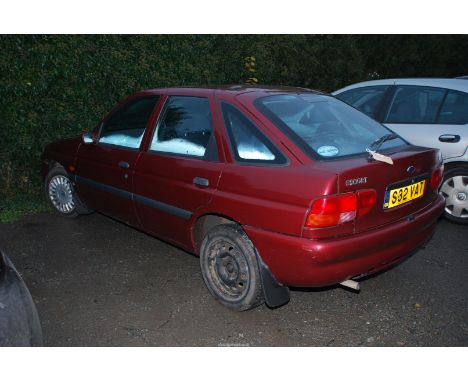 A very low mileage for its age Ford Escort 1,597 c.c. 16 valve Zetec, twin overhead camshaft petrol engined, five speed, five