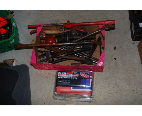 A Sealey wing cover, vehicle steering lock (no key), tyre lever bars, oil can, adjustable spanner, etc