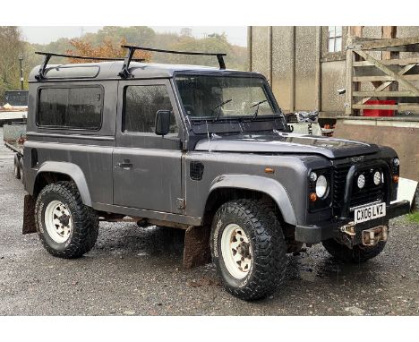 A Land-Rover Defender 90 short wheel-base TD5 Diesel-engined hardtop in metallic grey/ gunmetal and with a sweet sounding 2,4