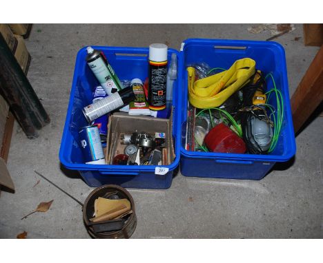 Two tubs and contents of 12 volt work lamp, wheel hub, tools, sprays, paints, switches, etc.
