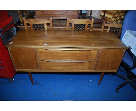 A mid century light oak sideboard, 57" wide x 18 1/2" deep x 30" high.