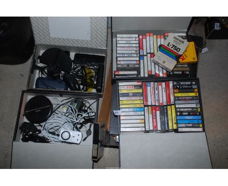 A large quantity of audio tapes, VHS tapes, CD player, Rolling Stones etc., 