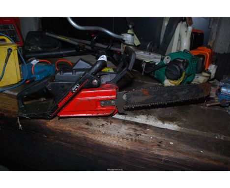 A Jonsered 2051 chainsaw, (no blade guard).