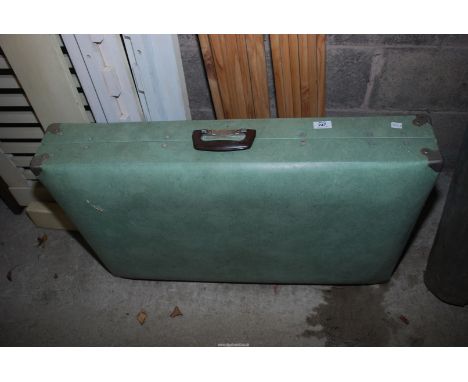 A vintage fold up massage bed.