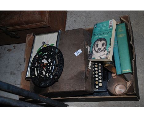A box of miscellanea, contents including books, typewriter etc.