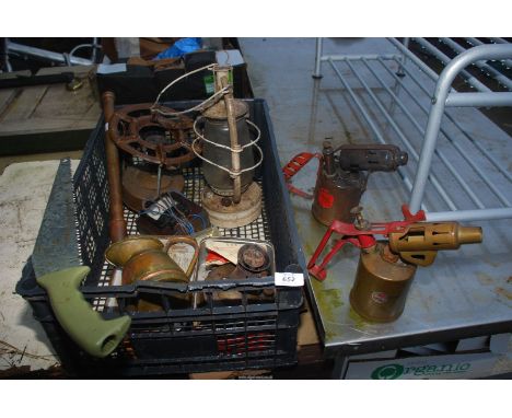 A brass blow lamp, stoves, American lamps etc.