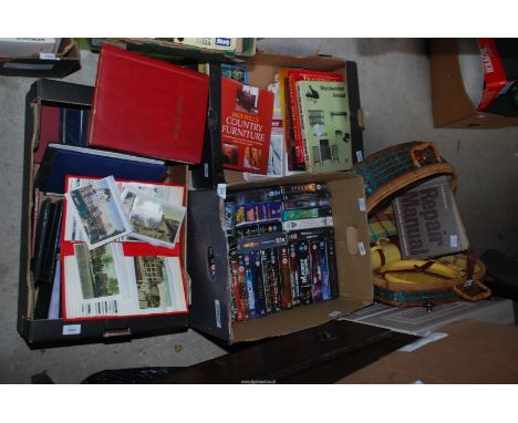 Three boxes contents to include old postcards, postcard albums, picnic hamper, DVD's and boxed DVD.