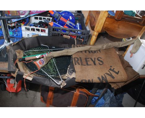 A small fishing rod, old jute sacks, keep net etc.