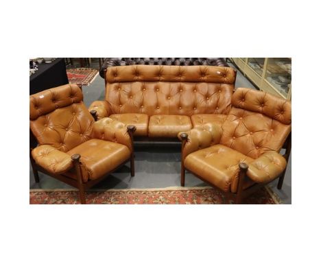 Guy Rogers for Heals, a mid 20th century three piece teak framed leather upholstered suite in the Santa Fe design, comprising