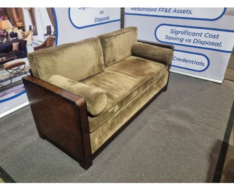 Burr Walnut 1920s wrap around outer shell style art deco sofa upholstered features convex sides; a seamless back; and two sea