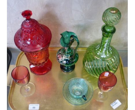 Six pieces of coloured glassware including green decanter, pair of Cranberry wines etc.