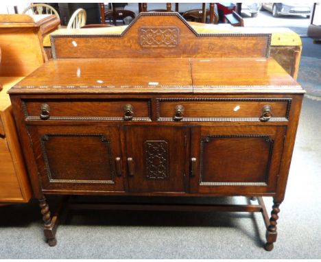 Oak barley-twist sideboard containing a Resselbell wind up gramophone with inbuilt speaker and record cupboard, 122cm wide