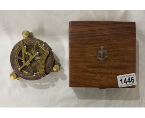 A brass multi sextant / sundial in brass bound teak box