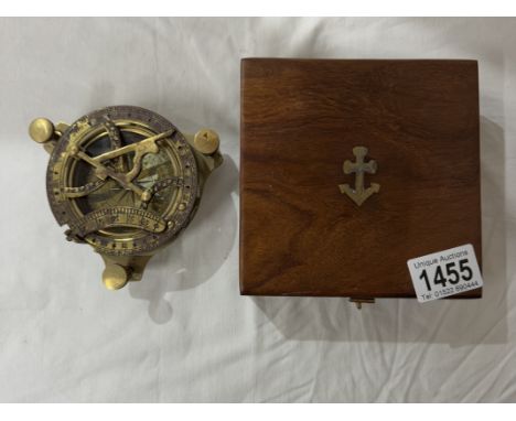 A brass multi sextant / sundial in brass bound teak box