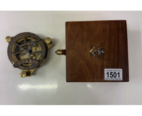 A brass multi sextant / sundial in brass bound teak box
