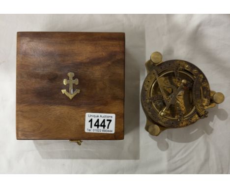 A brass multi sextant / sundial in brass bound teak box