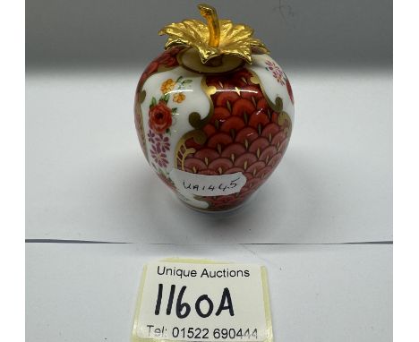 A Royal Worcester strawberry candle snuffer