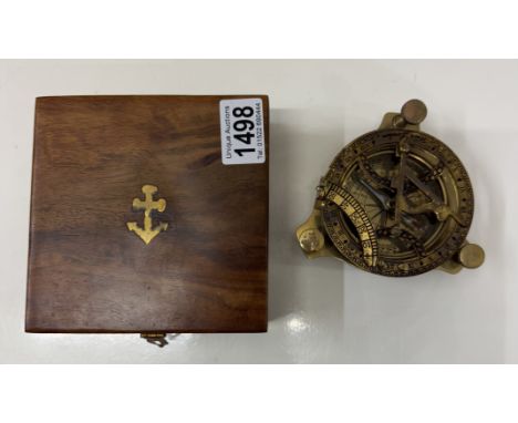 A brass multi sextant / sundial in brass bound teak box