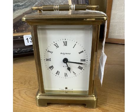 A Bayard brass carriage clock in working order, 11.5 cm tall.