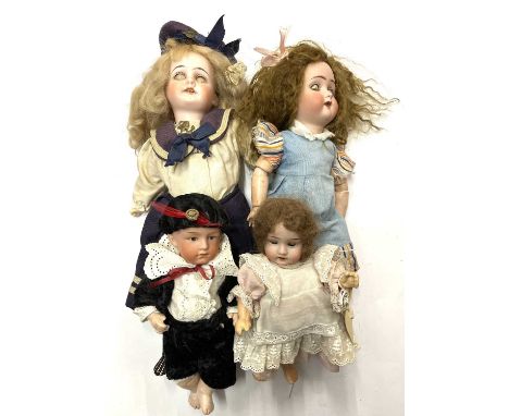 A mixed lot of various bisque head dolls, to include: - A sailor / Navy doll marked 1902 8/0 to nape - A boy doll in continte