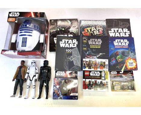 A large mixed lot of modern Star Wars merchandise to include: - A boxed R2-D2 3D Battery powered deco light by Disney - A box