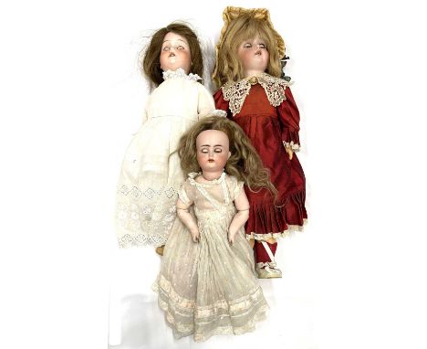 A mixed lot of medium-sized Simon &amp; Halbig bisque head dolls to include: - Marked 1909 to nape - Marked with K&amp;R to n