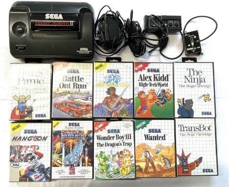 A 1990 Sega Master System II video game console and game pad in original box, to include several boxed games: - Wonder Boy II