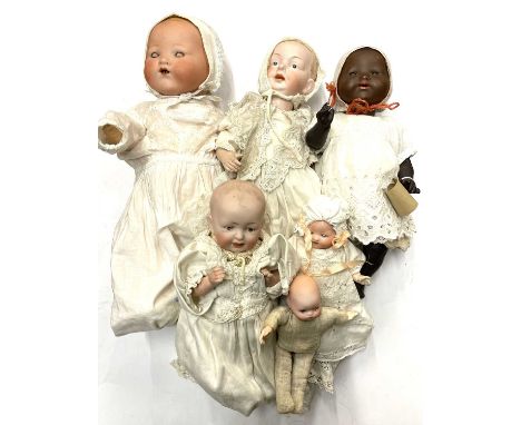 A mixed lot of various bisque head baby dolls, to include: - An Armand Marseille, marked 351./3.K. to nape - An Armand Marsei