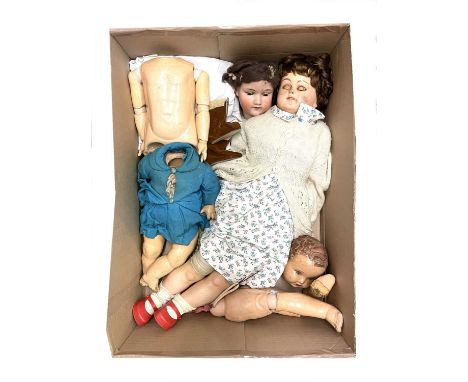 A mixed lot of dolls / doll parts to include: - A bisque dolls head, marked Armand Marseille Germany 390 A7M  - Unmarked cera