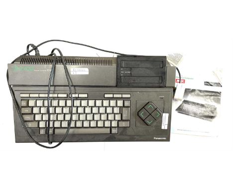A 1985 Panasonic MSX CF-2700 personal computer and original manual