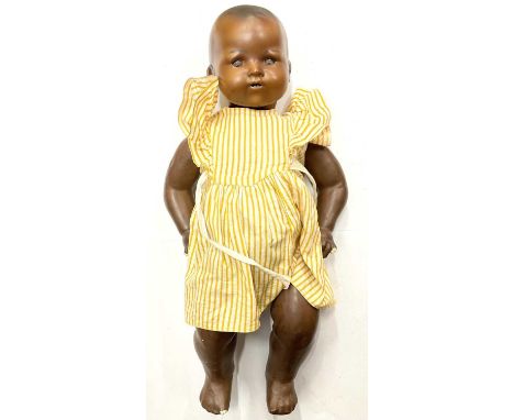 An Armand Marseille bisque head doll in yellow dress, marked 351./31/2.K to nape a/f