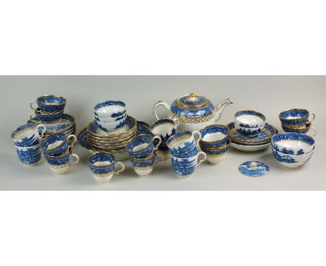 An assembled Caughley Fitzhugh border part tea service, circa 1790, comprising twelve teacups, teapot and cover, teapot stand