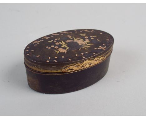 A 19th century French tortoiseshell snuff box, of oval form, the lid with floral two colour yellow metal pique work, over a f