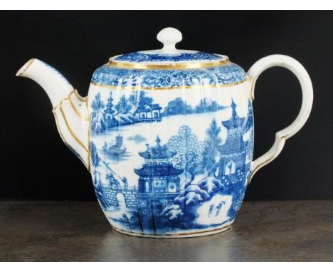 A Caughley teapot with associated cover, circa 1785-90, of new, fluted form with moulded spout and double indented ear shaped