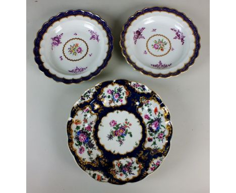 A pair of Worcester lobed dessert plates decorated with Sweet William flowers, circa 1775-90, painted in puce and polychome w