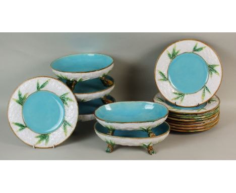 A majolica dessert service, George Jones, circa 1870-80, each piece with bamboo and basket weave decoration and log feet and 