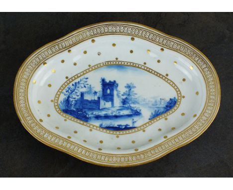 A rare Caughley dessert tureen stand, circa 1788-93, painted in a light, bright underglaze blue colour, combined with an elab