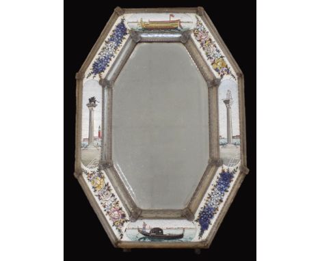 A Venetian glass mosaic mirror, second half 19th century, the octagonal frame encrusted with polychrome flowers applied in re