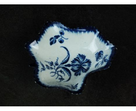 A Worcester leaf shaped pickle dish, circa 1770, decorated with the Gillyflower pattern in blue, C mark, 6cm wide (small chip