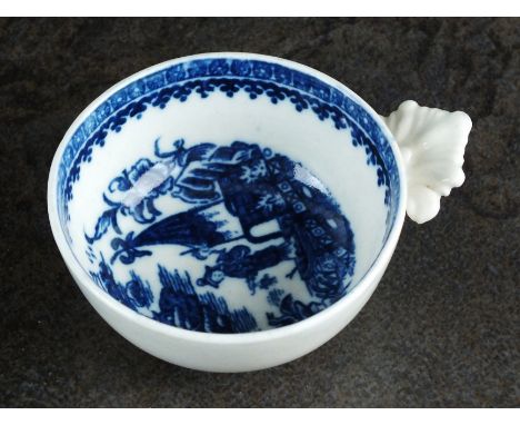 A Caughley wine taster, circa 1780, having moulded leaf handle, transfer-printed in underglaze blue with the Pleasure Boat pa