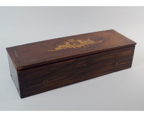 A mid 19th century simulated rosewood and marquetry Swiss music box playing eight airs, the single piece comb at fault playin