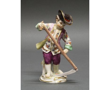  Porzellanfigur, "Gärtnerknabe mit Sense", Meissen, Schwertermarke, 1. Wahl, Modellnummer 3 K, polychrom und goldstaffiert, 