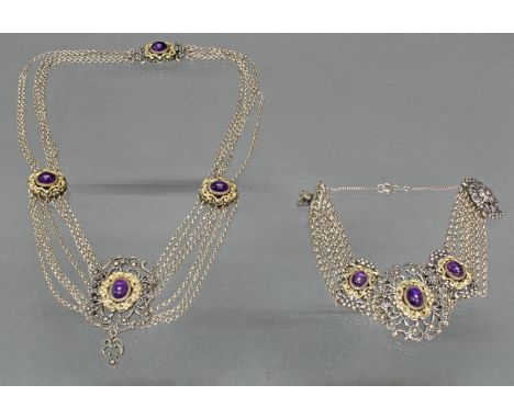   Trachtenschmuck-Set, um 1900, Silber 800: Collier und Armband, je mit 3 Amethyst-Cabochons auf vergoldeter Rosette, zus. 86