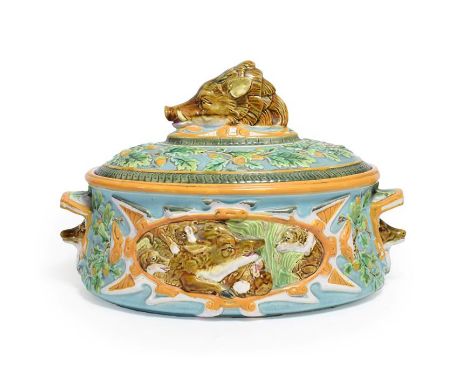 A George Jones Majolica Game Pie Tureen, Cover and Liner, circa 1875, of oval form with boar's head knop and handles, modelle