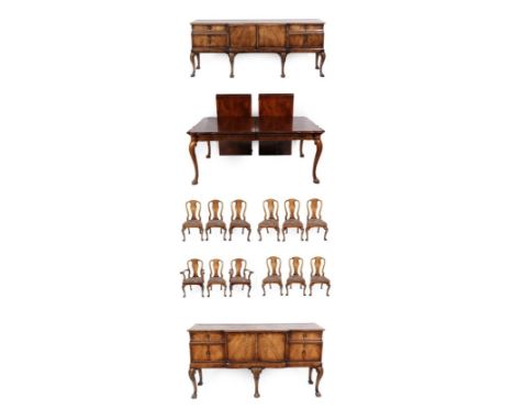 An Early 20th Century Fifteen Piece Walnut Dining Room Suite, comprising an extending dining table with two original leaves, 