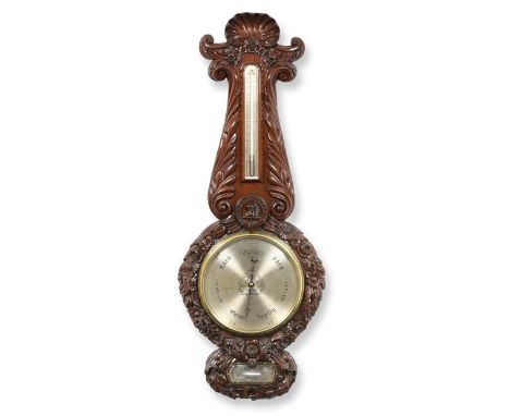 A Victorian Mahogany Carved Wheel Barometer, signed T.Pritchard, London, circa 1850, finely carved case with a shell motif pe