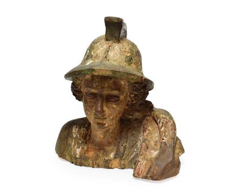 An Italian Carved and Polychrome Wooden Bust of a Soldier, 16th/17th century, wearing a helmet and robes, 38cm high See illus