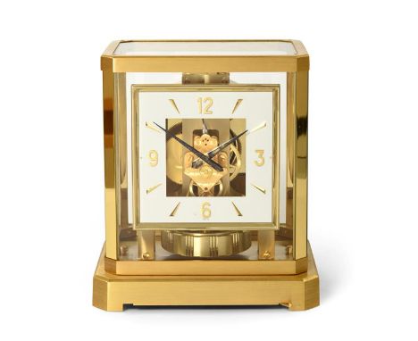 A Brass Atmos Clock, signed Jaeger LeCoultre, 20th century, case with glazed panels, base with stop/start lever, 5-inch squar