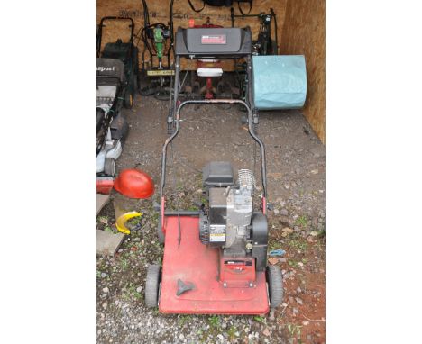 A MTD V38G petrol lawn aerator (engine pulls freely but hasn't been started)